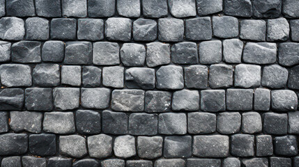 Dark gray rough cobblestone, street pavement, background