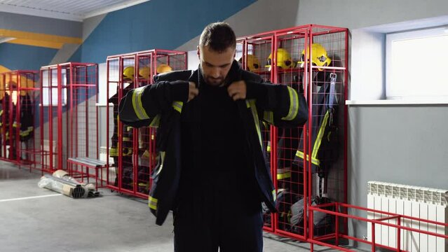 Fireman changing clothes in fire department
