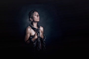Portrait of a Chained woman representing the oppression of women