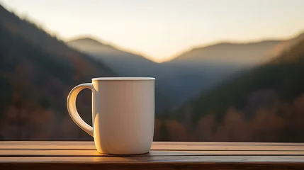 Foto op Canvas Close up of a ivory Mug on a wooden Table in the Mountains. Blurred natural Background © drdigitaldesign