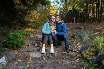 Happy couple in autumn park