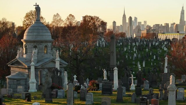 Drone footage of an empty cemetery in New York City. Shot during an autumn sunset in 4k.