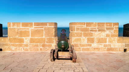 Historic cannon inside Essaouira Citadel, a robust fortress along Morocco's coast, located in the...