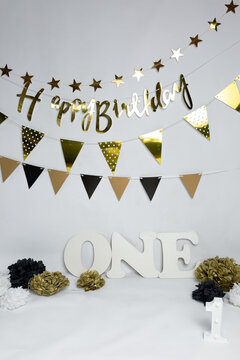 children's holiday. first birthday.
  photo zone for birthday black and gold decor