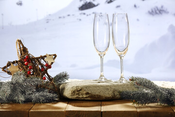 Desk of free space empty glasses. Winter landscape of mountains. 