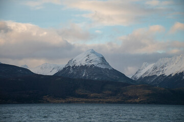 portrait of a snowy mountain in the golden hour, in the Beagle Channel, Ushuaia. patagonian winter