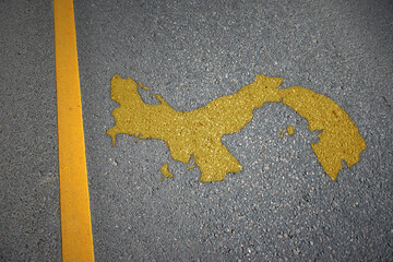 yellow map of panama country on asphalt road near yellow line.