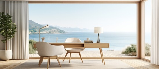 Obraz premium Modern living room with beige textile and light oak wood furniture featuring a workplace table and overlooking the sea through a French window copy space image