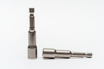 iron nozzle for roofing screws on a white background. metal adapter for screwing in self-tapping...