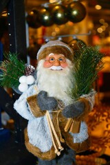 Festive holiday decorations around a traditional Christmas tree.