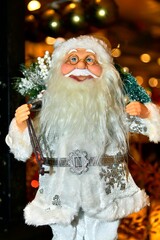 Festive holiday decorations around a traditional Christmas tree.