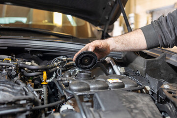 Capture the essence of automotive expertise in our workshop: where skilled hands craft precision,...