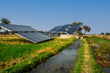solar panels and tube well for irrigation on a farm