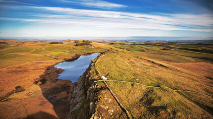 Scenic aerial landscape photo of the nature at Sycamore Gap, UK