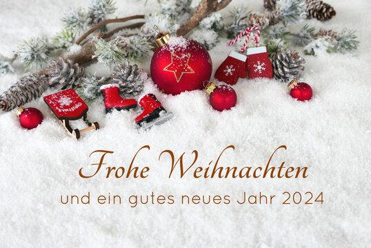 Weihnachtskarte: Winterliche Kulisse mit Weihnachtsgrüßen, Schlittschuhen, Weihnachtskugeln und Zweigen im Schnee. Frohe Weihnachten und ein gutes neues Jahr 2024.