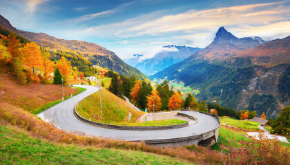 wonderful nature landscape of switzerland vivid autumn scenery of maloja pass switzerland europe amazing serpentine road is a most popular place of travel and outdoor vacations in swiss alps - obrazy, fototapety, plakaty