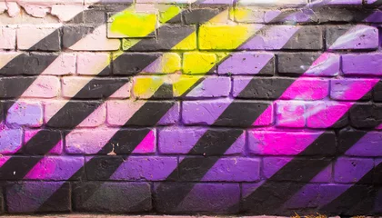 Papier Peint photo Lavable Mur de briques graffiti background on a brick wall black yellow purple pink girl