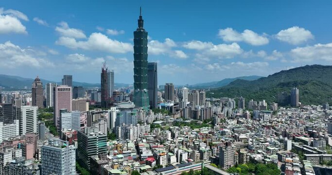 Drone fly over the Taipei city skyline