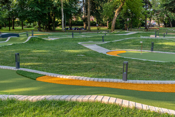 Fototapeta premium Beautiful mini golf course at sunny day.