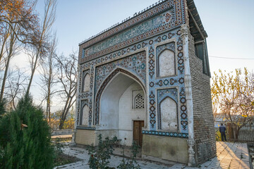 Fototapeta premium Views of a mausoleum at the Sary Mazar complex in Istaravshan, Tajikistan.