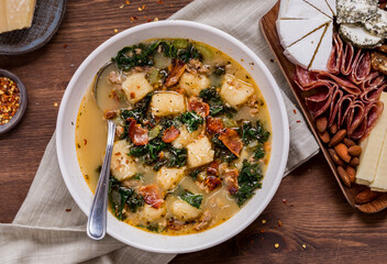 Zuppa toscana soup with cauliflower gnocchi served with deli meats and cheeses.