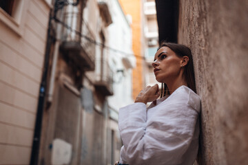 Beautiful woman tourist at the centre of old town of Tartagena