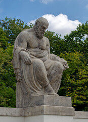 1 of the 16 statues of famous playwrights at the Amphitheatre in Lazienki Park, Warsaw, Poland