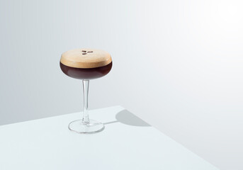 Espresso Martini. cocktail on table with white background