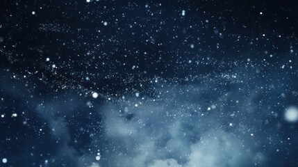 Obraz premium a black and white photo of a night sky with snow flakes on the ground and clouds in the foreground.