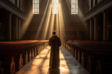 Foto op Plexiglas Christian monk in a church deeply immersed in prayer experiencing the revelation of divine light. Ai generated © dragomirescu