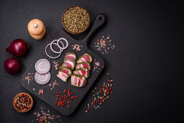 Delicious fresh bacon stripes with spices and salt