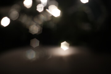 Defocused copy space. Low key. New Year's background, champagne, sparkling wine