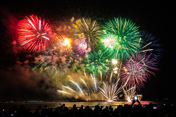 Colorful fireworks, beautiful like stars, black sky, Pattaya beach fireworks, New Year's festival and tourism festival.