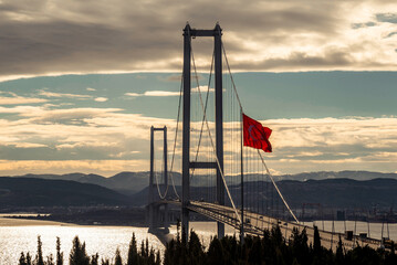 The Osman Gazi Bridge is a suspension bridge spanning the Gulf of İzmit. The bridge links the Turkish city of Gebze to the Yalova Province and carries the motorway across the gulf