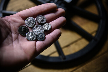 Antique Roman coins, denarius, found by a metal detector - obrazy, fototapety, plakaty