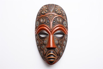 African ethnic ritual mask isolated on white background. Wooden Tribal Mask of warrior with carved ornaments. Blend of Tradition and Modernity. Traditions and customs of Africa. Travel souvenir.