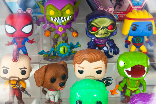 Motril, Spain - 09.24.2022: Collectible figurines of funko pop on a shop window, close-up.