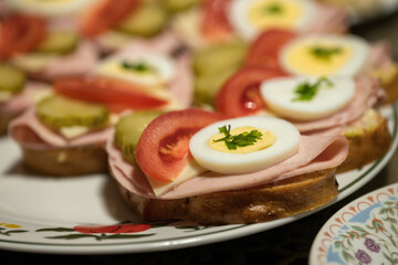 Buns with an egg on a plate.