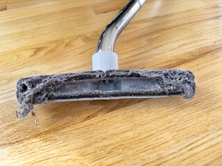 All the dust that doesn't make it into the vacuum cleaner - brush needs cleaning out
