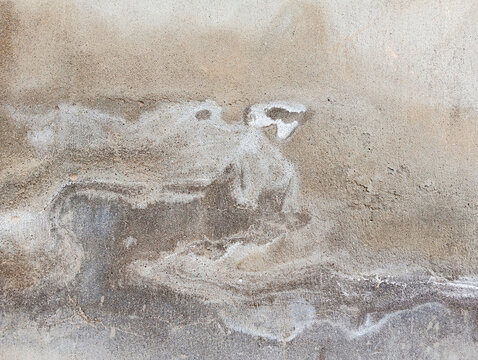 Abstract grunge background.  Old cement gray wall with humidity stains. Water stains on concrete wall with cooy space.