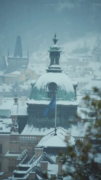 landscape in winter in Prague, Czech Republic with Straka Academy dome.