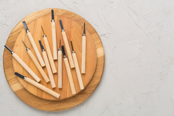 Carpenter tools on concrete background,top view