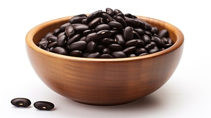 Fototapeta premium organic black beans in a bowl on white background 
