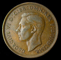 Old British penny coin, king George VI portrait