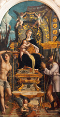 VICENZA, ITALY - NOVEMBER 5, 2023: The renaissance painting of Madonna with the St. Sebastian and St. Roch in church Chiesa di Santa Maria dei Servi by Benedetto Cincani - il Montagna (1480 - 1558).