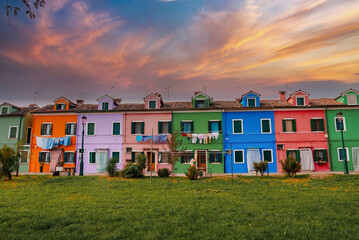 Vibrant and charming, this picturesque scene showcases a row of colorful houses on the island of...