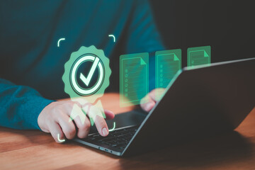 User use a laptop for assessment sign of service quality assurance certificate for business. Work and assessment certificate, evaluation online survey exam, exam international standard certification.