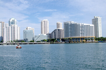 Photography of a Florida Bay with building in background.