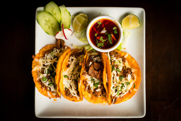 Birria beef tacos with broth