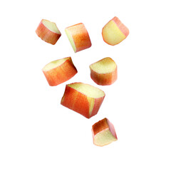Pieces of fresh ripe rhubarb falling on white background
